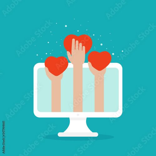 hands holding red hearts on computer screen. universal worldwide on-line help and support concept.