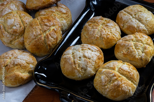 swiss buns freshly prepared in the oven photo