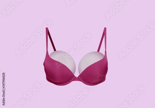 Silicone breast art. Pink bra. Breast implant disease. Plastic surgery. Breast augmentation. Mammoplasty