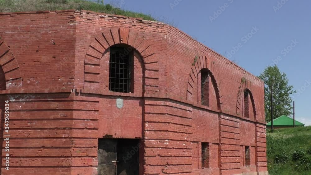 A large red brick tower. Old Fortress Building A large red brick tower. Old Fortress Building
