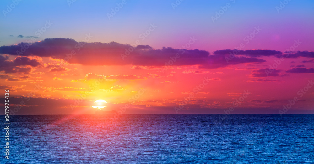Bright sunset over the sea in the tropics