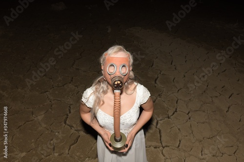 apocalypse. bride with gas mask.