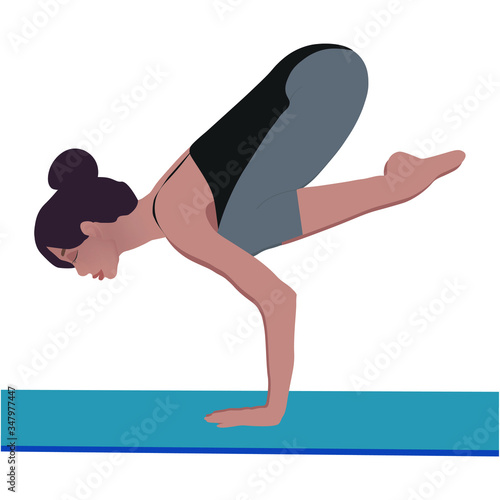 Professional yogi girl doing yoga standing in a difficult pose on a rug