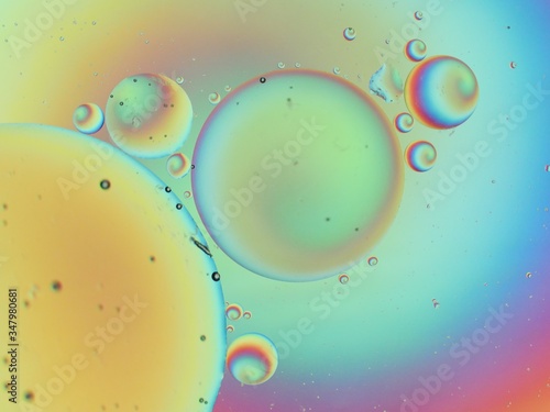 Oil and water macro abstract background with bubbles
