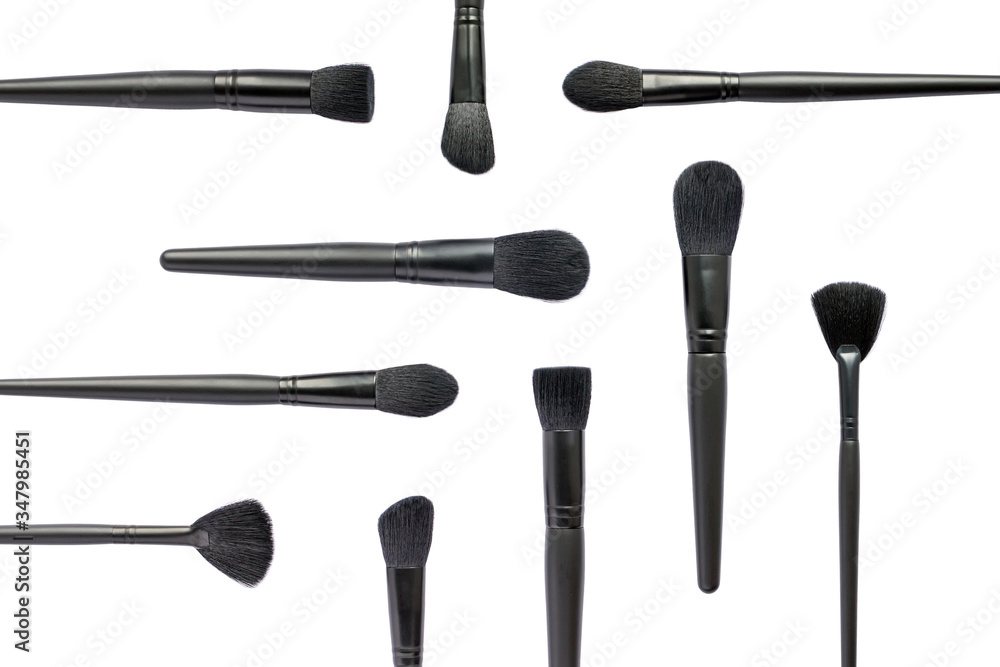 Makeup brushes collection isolated on white background. Flat lay of various make-up brushes. Top view Makeup brushes collection isolated on white background. Flat lay of various make-up brushes. Top view