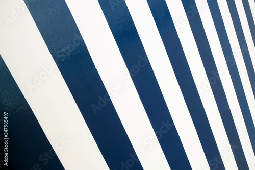 Wallpaper Mural Empty surface with broad diagonal dark blue and white stripes. Torontodigital.ca