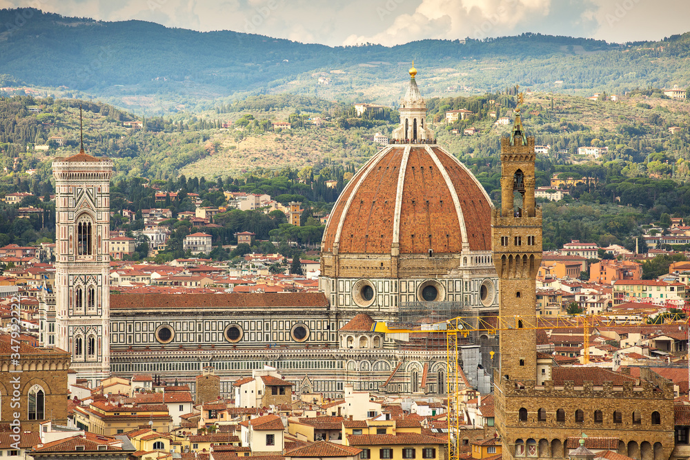 Florence. Tuscany, Italy.Beautiful views of the facade of the Cathedral of St. Mary of the Flower (Cathedral of Santa Maria del Fiore) the tiled roofs of the nearest dwellings.