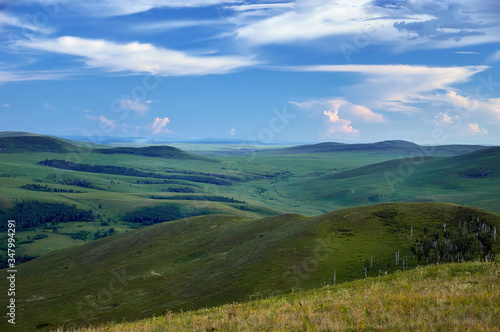 Green steppes and hills on a summer day. Zabaykalsky Krai. Russia. © Anna
