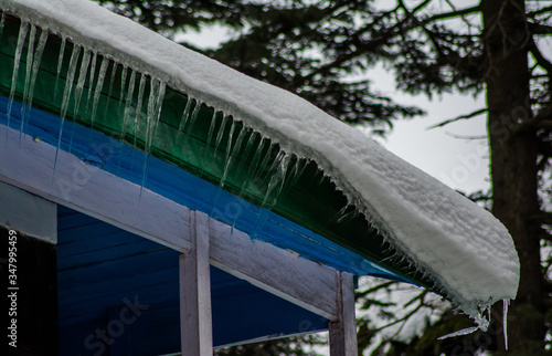 Ice dams with a cold roof at Patnitop Jammu India, Winter landscape
 photo