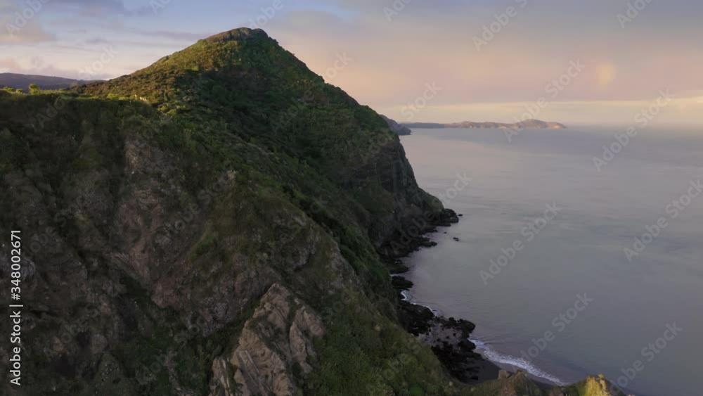 Aerial: Native Forest and Manukau harbour in the Waitakere Ranges. Whatipu, Auckland, New Zealand Aerial: Native Forest and Manukau harbour in the Waitakere Ranges. Whatipu, Auckland, New Zealand
