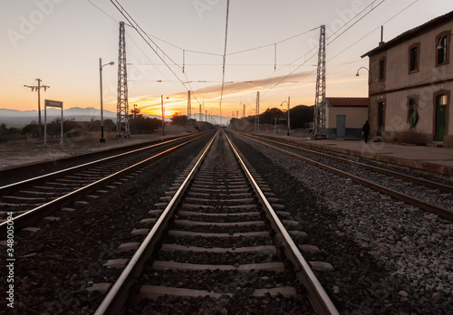 sunset on the train tracks in Avila, Spain