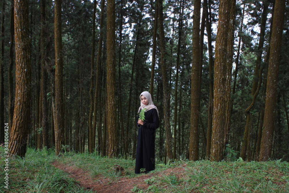 Hijab girl in the forest