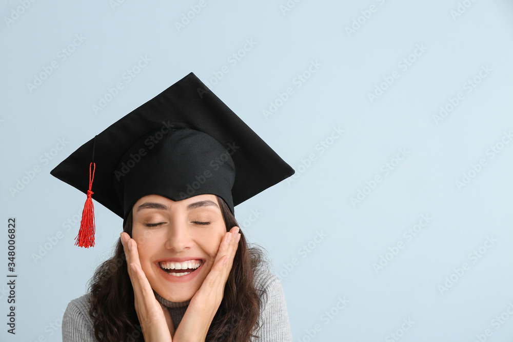 Female graduating student on light background Female graduating student on light background