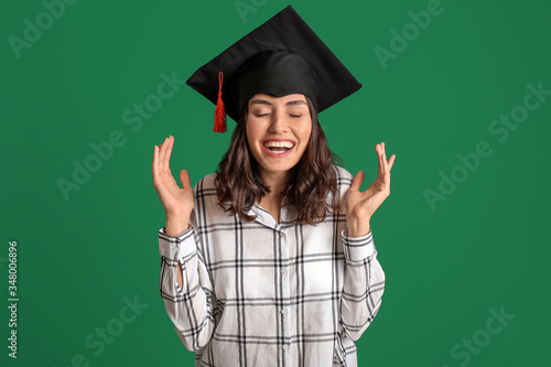 Happy female graduating stu...