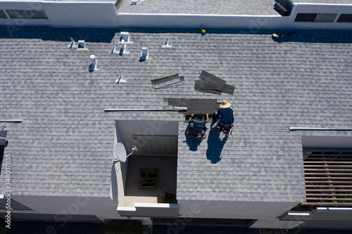Roof Repair Inspection In Progress Aerial Above Head Condo Building Gray Shingles 2 Roofers