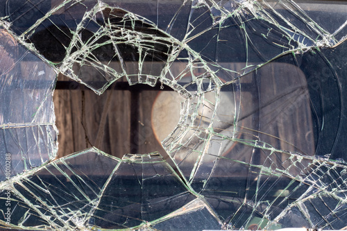 Close up of broken glass from the windshield of a truck