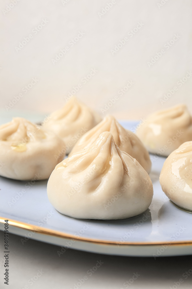 Plate with tasty dumplings, closeup