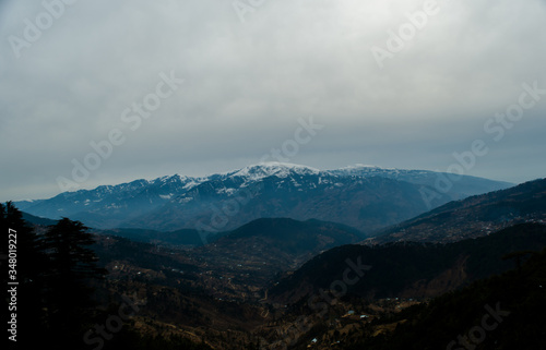 Fototapeta Naklejka Na Ścianę i Meble -  beautiful city and himalayan mountain range view from mountain of vaishnodevi, patnitop and Nathatop Jammu
