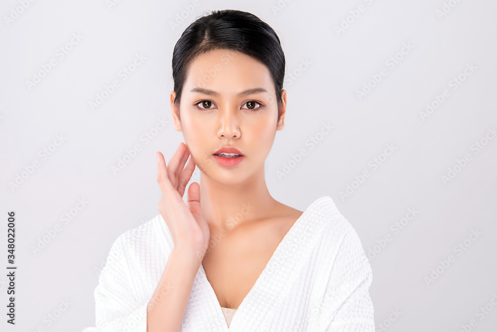 Beautiful Young Asian Woman with Clean Fresh Skin. Face care, Facial treatment, Cosmetology, beauty and healthy skin and cosmetic concept, woman beauty skin isolated on white background Beautiful Young Asian Woman with Clean Fresh Skin. Face care, Facial treatment, Cosmetology, beauty and healthy skin and cosmetic concept, woman beauty skin isolated on white background