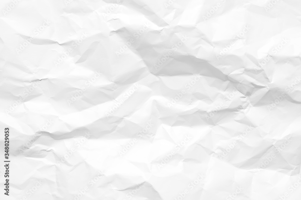 White crumpled paper texture background. Clean white paper. Top view. White crumpled paper texture background. Clean white paper. Top view.