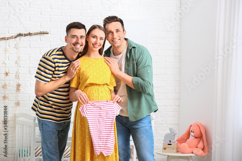 Gay couple and pregnant wom...