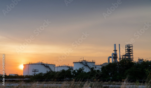 Wallpaper Mural Oil refinery terminal is industrial facility for storage of oil tank and petrochemical. oil manufacturing products ready for transport and business. Oil price falls due to the corona virus outbreak Torontodigital.ca