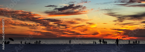 sunset over the beach, sky, clouds, water, sea, red, orange, dusk, horizon, ocean, summer, Siesta Key, Florida