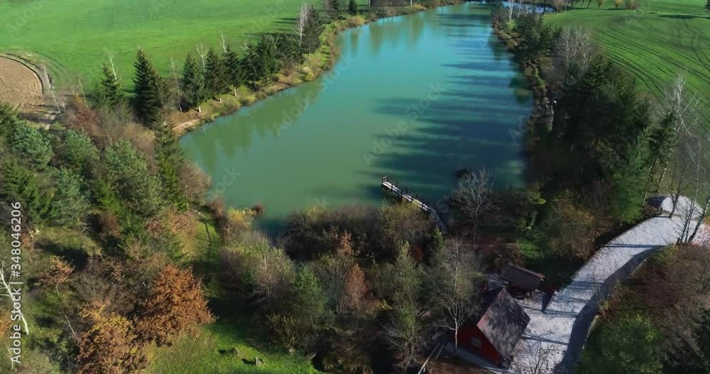 Drone flyover lake with pine trees around in Bosnia and Herzegovina Drone flyover lake with pine trees around in Bosnia and Herzegovina