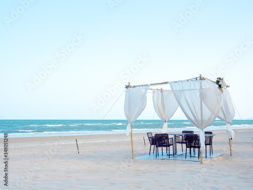 Romantic dining table on the beach.