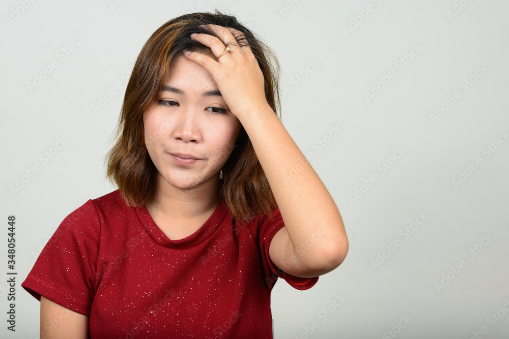 Portrait of young Asian woman with short hair Portrait of young Asian woman with short hair