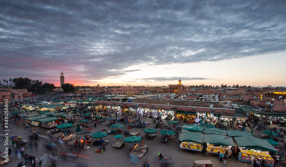 Obraz premium Jamaa el Fna is a square and market place in Marrakesh's medina quarter (old city) with clouds in background, Marrakesh, Morocco, north Africa