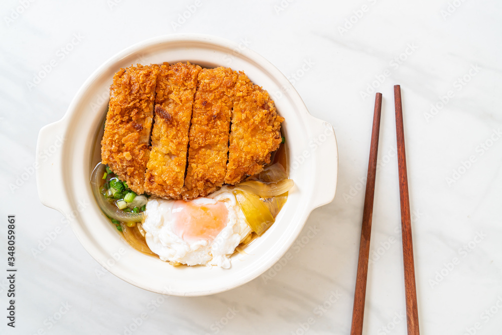 Japanese fried pork cutlet (katsudon) with onion soup and egg