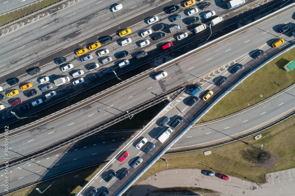 MOSCOW, RUSSIA - APRIL 15, 2020: An aerial view of a traffic congestion on an interchange of Mozhaiskoye Shosse and  Moscow Ring Road during the pandemic of the novel coronavirus disease (COVID-19)