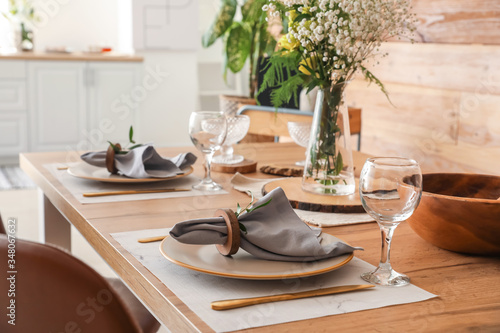 Served table in modern dini...
