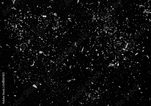 Dust background. Grunge photo editor layer. White flakes on black copy space.