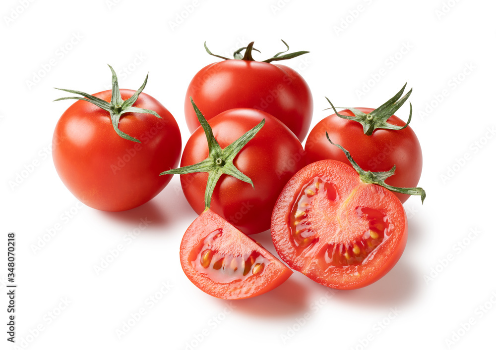 Tomatoes placed on a white background and cut tomatoes Tomatoes placed on a white background and cut tomatoes
