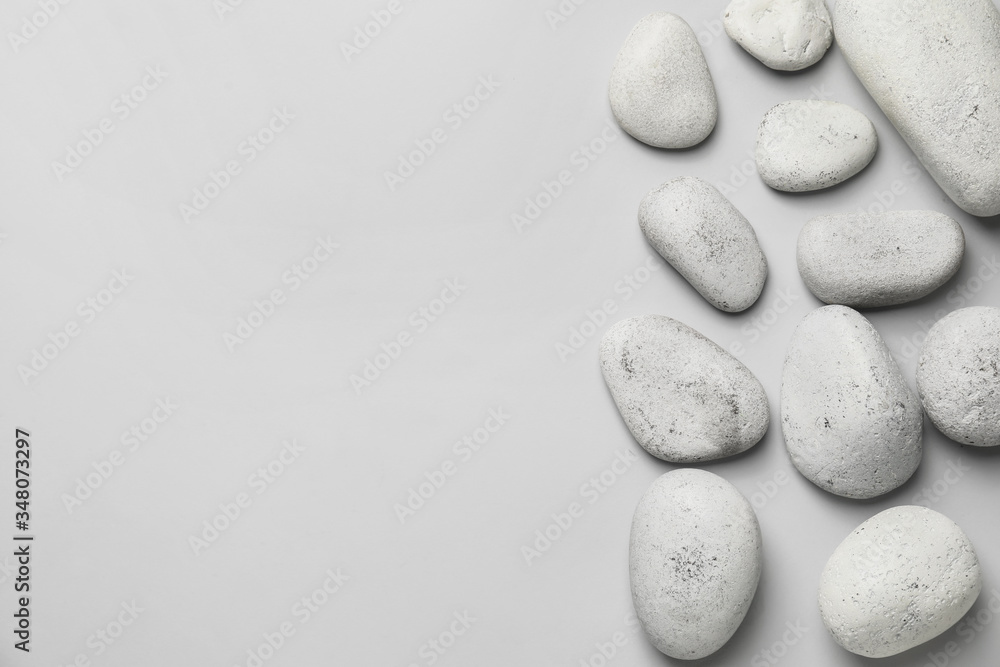 Spa stones on light background