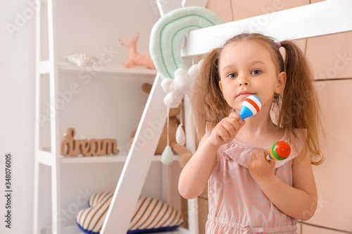 Little girl playing at home