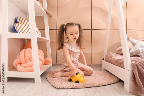 Little girl playing at home