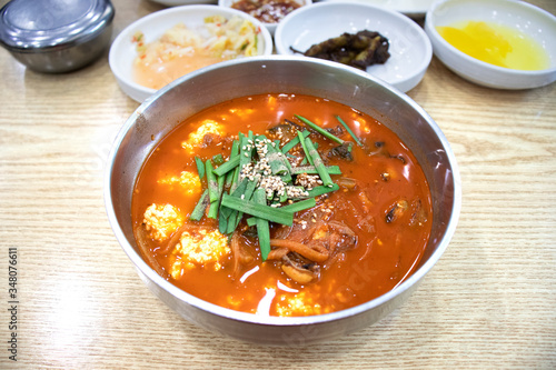 Spicy soup with soft tofu and seafood, Chinese style spicy soup. Spicy tofu soup.