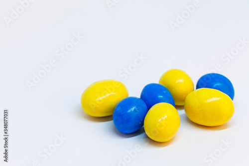 blue and yellow candy eggs for Easter © Peter
