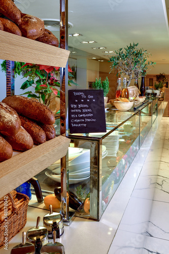 Fresh bread rack display in a traditional italian restaurant