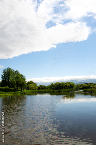 Park view with lake and mountain. forest lake. © Creative