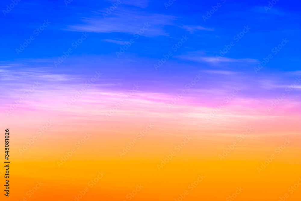 Multi color light in sky with blur clouds