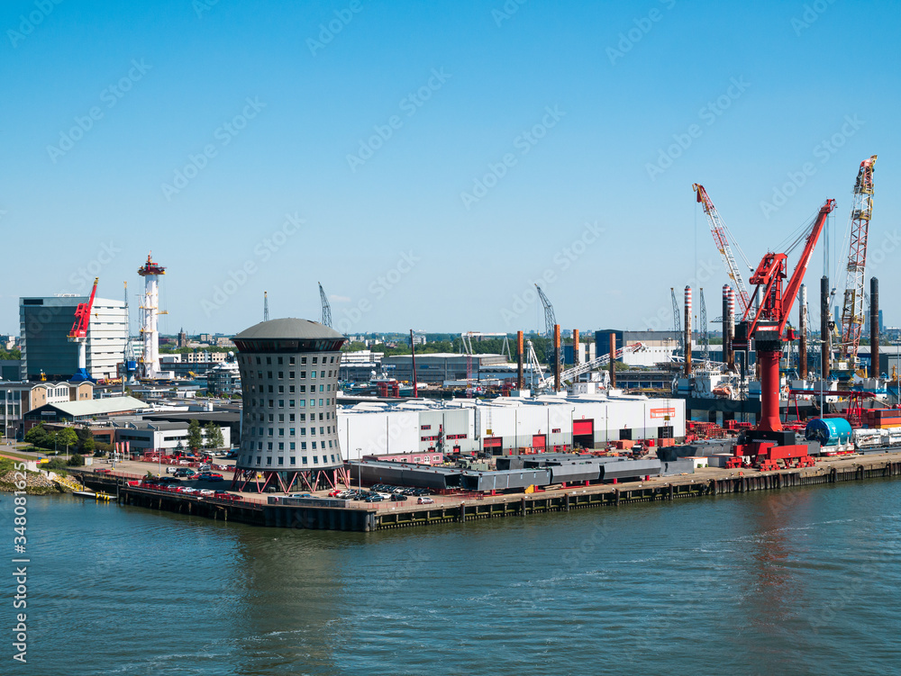 Rotterdam, Netherlands - May 07, 2020: view on the cargo port buildings infrastructure from cruise ship