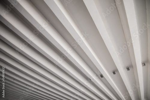 Pattern of concrete bars under the deck in a parking house
