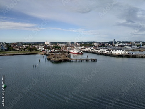 Southampton, UK - May 05, 2020: view on the cargo and cruise ship port buildings infrastructure from the cruise ship © STUDIO MELANGE