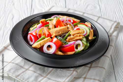 Healthy canned tuna salad with tomatoes, cucumber