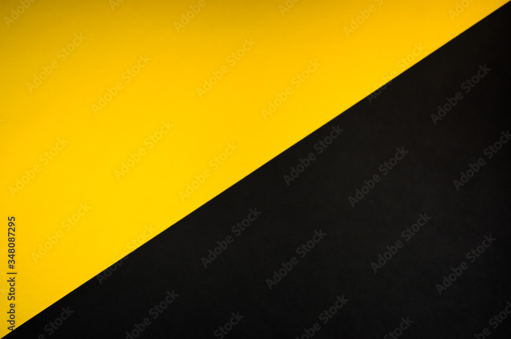 Yellow and black diagonally divided abstract background Yellow and black diagonally divided abstract background