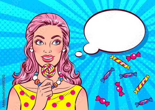 Smiling young woman with pink hair holding lollipop in hand. Empty speech bubble. Pop art comic vector retro illustration. 